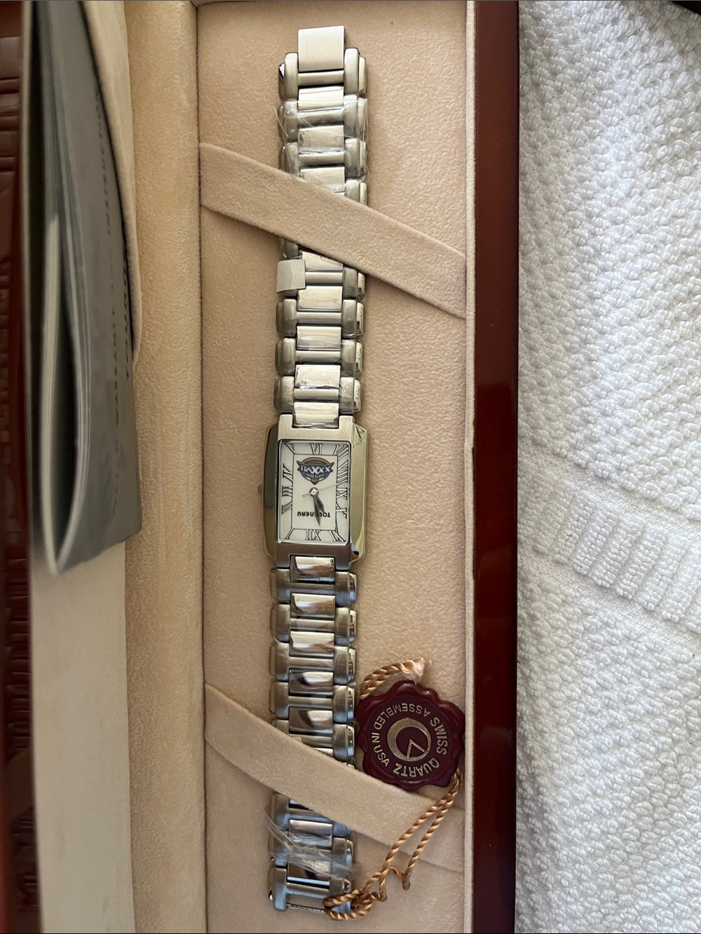 Tourneau Silver Women's or Men’s Rectangular Tank Watch with White Dial.